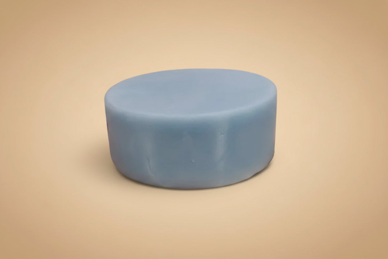 Round blue object on a white background